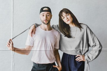 Obraz premium Portrait of a young couple in street fashion