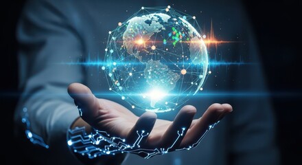 Fototapeta premium Digital hologram of the earth floats above a person's open palm to represent global connectivity and innovation.