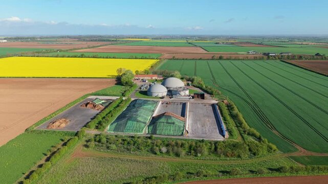 Aerial view of a biogas renewable energy plant with domes in the Lincolnshire countryside UK