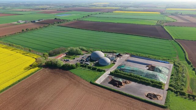 Aerial view of a biogas renewable energy plant with domes in the Lincolnshire countryside UK