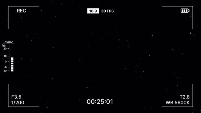 Camera recording overlay with subtle film grain and dust particles on dark background for cinematic. Film digital camera recording HUD minimal design with camera frame and film grain particle. 4K