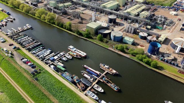 Close up aerial view of yachts and narrowboats docked in a marina near Rawcliffe Bridge UK