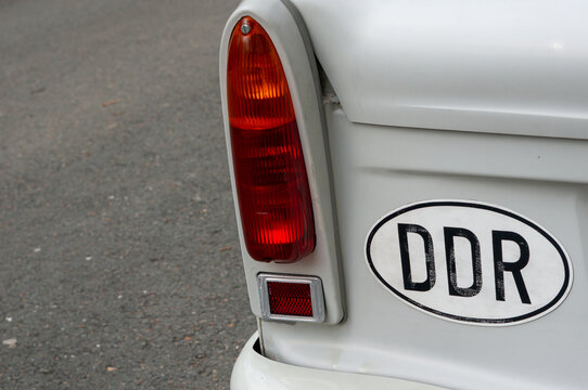 Rear lights of a Trabant 601 with DDR symbol sign wallpaper ostalgia