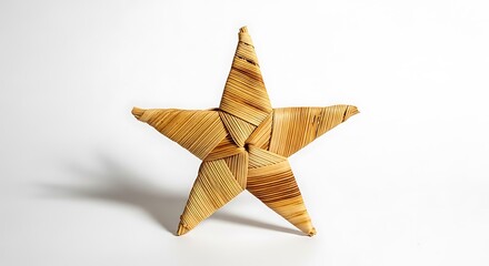 Fototapeta premium A woven star decoration made of natural fibers on a white background