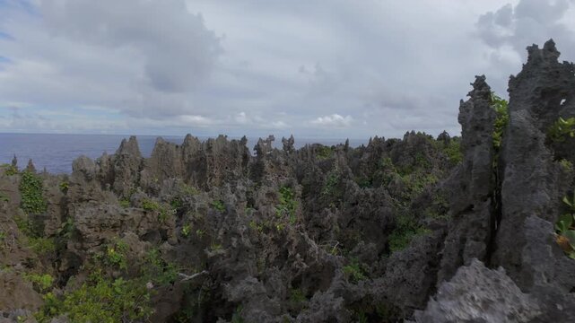 FPV Drone Flying Through Narrow Rock Canyon in Niue