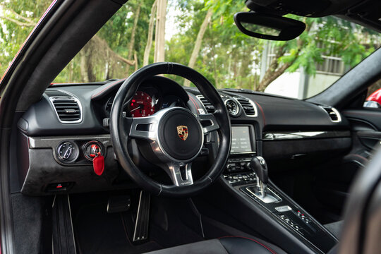 Porsche cayman gts steering wheel and dashboard, Modern luxury sports car interior driver cockpit