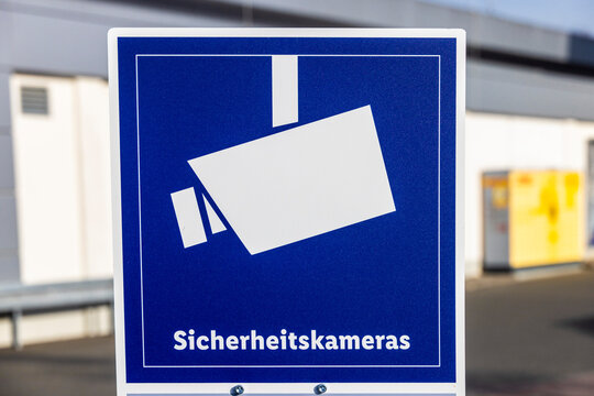 Security camera surveillance sign warning monitoring area