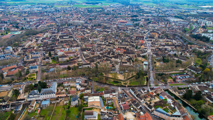 Obraz premium Aerial of the old town of Beaune in France on a cloudy morning in early spring.