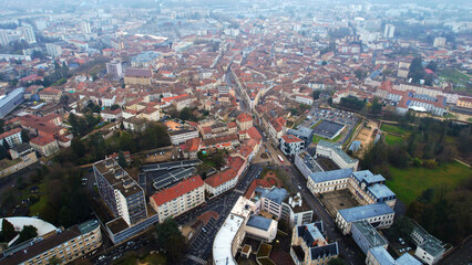 Obraz premium Aerial view around the city Ambérieu-en-Bugey in France on a low cloud afternoon in late winter.