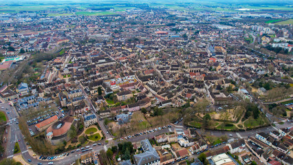 Obraz premium Aerial of the old town of Beaune in France on a cloudy morning in early spring.