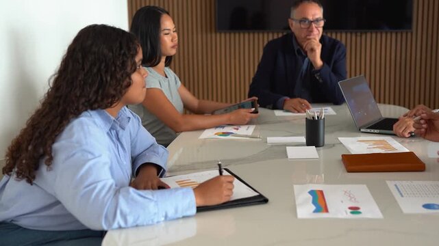 Multi generational business people working together inside modern office - Multiracial colleagues, job deal and corporate concept