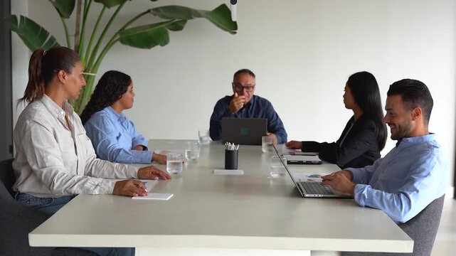 Multi generational business people working together for financial company inside modern office - Multiracial colleagues, corporate and teamwork concept