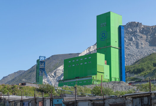 KIROVSK, RUSSIA - JULY 27, 2024: View of the industrial building of the mining and processing plant of JSC Apatit (Phosagro) on a sunny July day. Kirovsk, Murmansk region