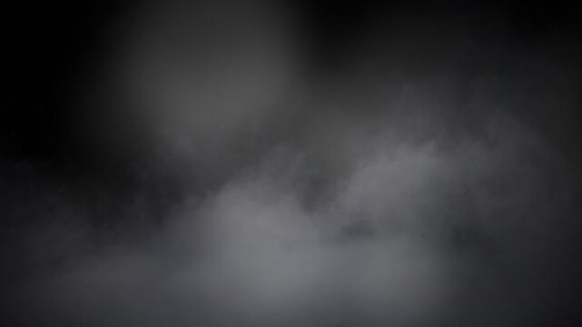 Mysterious Fog Swirls on Black Background