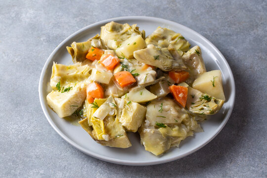 Traditional Turkish Braised Artichoke (Enginar) with Potatoes and Carrots in Olive Oil
