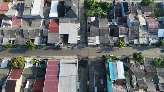Aerial View of Residential Area with Houses and Roads in a City.