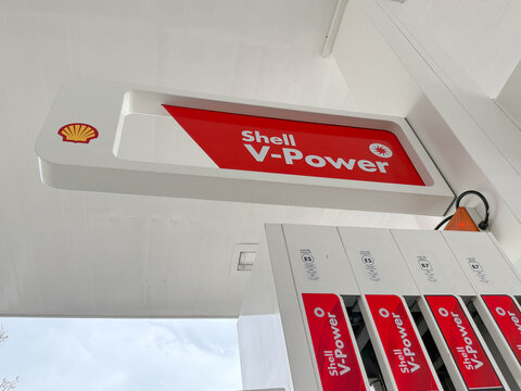 17.04.2026, Konya, Turkey: Modern gas station fuel pump with Shell V Power branding red signage under white canopy, low angle view emphasizing energy industry, transportation services,
