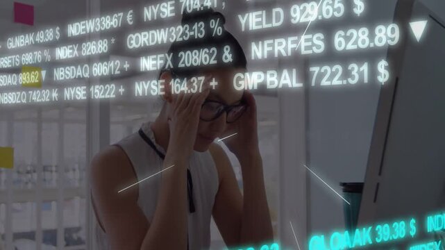 Analyst studying screen scrolling ticker causing rubbing eyes lifting specs refocusing for finance