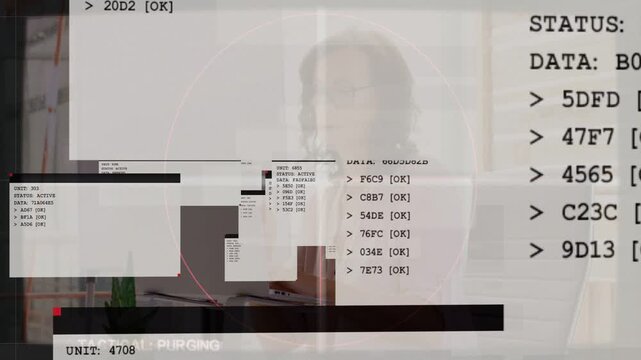 Woman typing at laptop initiating tech reticle, unit IDs and status lists sliding over face