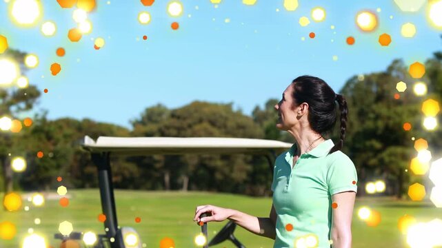 Woman turning, resting on club by golf cart while gold bokeh growing around her, promoting golf