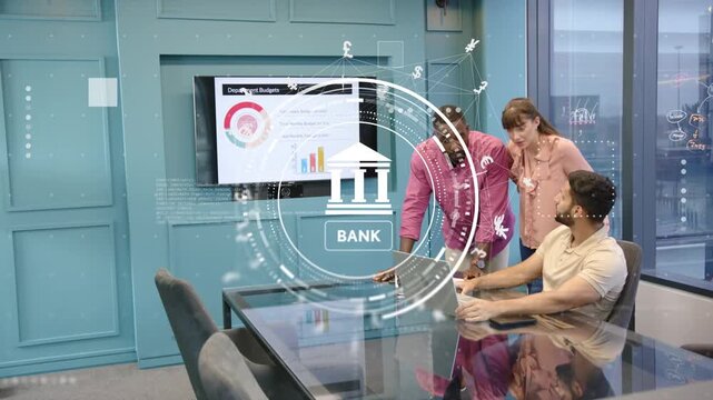 Team leaning around laptop in meeting, man placing hand and pointing, bank overlay guiding budgets