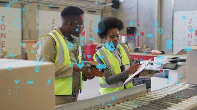 Two workers verifying orders at packing line, using scanner, initiating blue HUDs, resuming packing