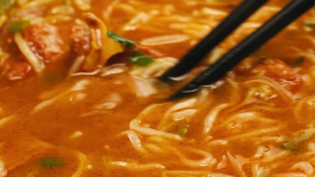 Vietnam traditional pho bo soup on delivery, Beef noodles. Pho Bo Soup with beef, rice noodles, ginger, lime, chili pepper in bowl. Vietnamese cuisine. Pho Noodle Soup restaurant Close-up.