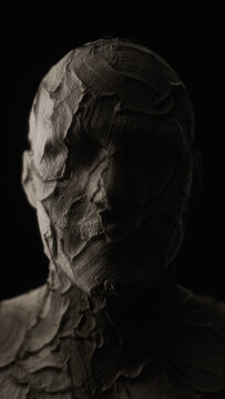 Bust of a man made of clay.