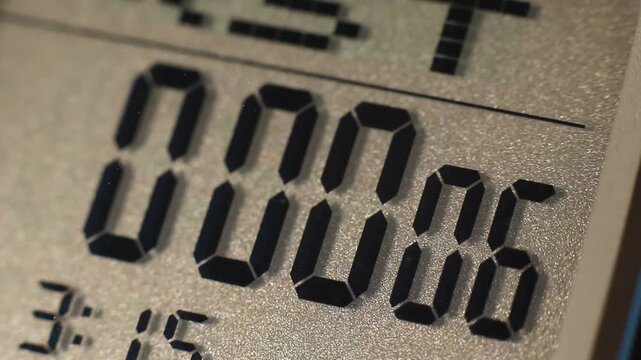 Digital timer and stopwatch running on a digital watch lcd display