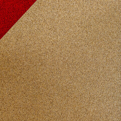 Fototapeta premium Colorful pattern of red and beige creating a modern design on a surface in a studio setting