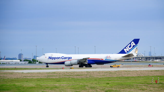 Nippon Cargo Airlines aircraft Boeing 747-8F at the Dallas Fort Worth International Airport (DFW). 40th Anniversary sticker.