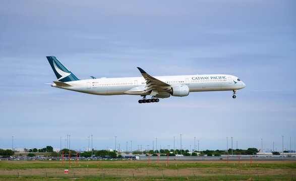 Cathay Pacific Airways aircraft Airbus A350-1000 approaching the Dallas Fort Worth International Airport (DFW).