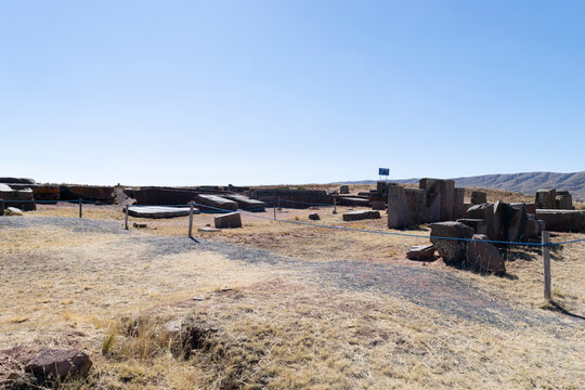 Tiwanaku ancient megalithic ruins in bolivia under blue sky