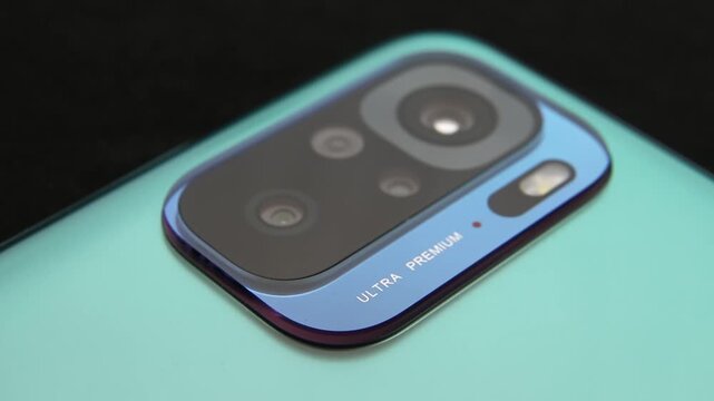 Macro close up of a smartphone camera lens on back
