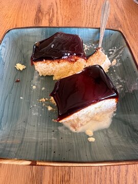 Top view of delicious cake slices served on a ceramic plate