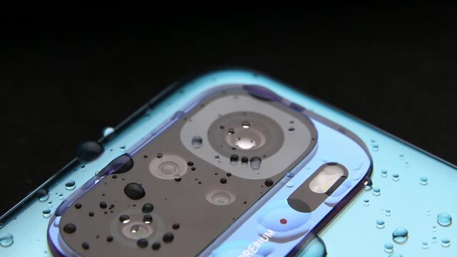 Macro close up of a smartphone camera lens on back
