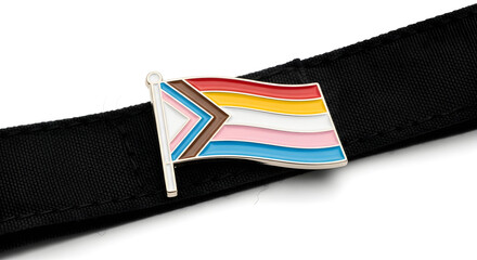Naklejka premium A close-up view of a black belt with a colorful, striped buckle on a white background.