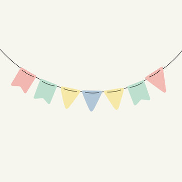 Colorful festive bunting flags hanging on string.