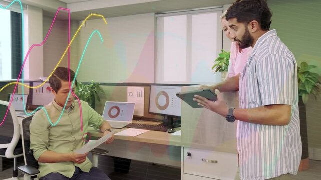Seated analyst taking paper after peer handing tablet team parsing data with donut charts popping