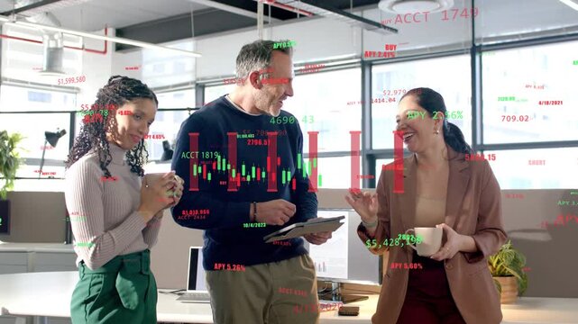 Man pointing tablet and team talking markets, shifting into laughter, faint overlay showing charts