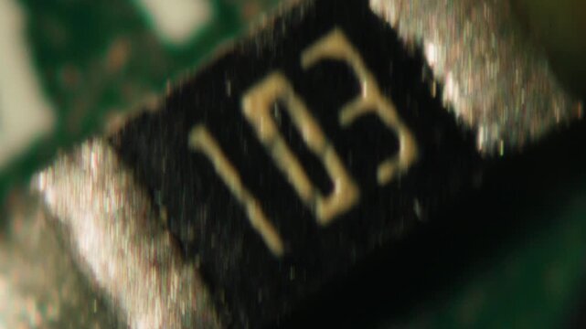 Macro Close-up Shot of Microchip, CPU Processor on Printed Circuit Board, Computer Motherboard with Components Inside of Electronic Device, Part of Supercomputer microscop.