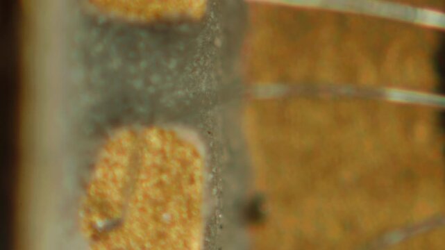 Macro Close-up Shot of Microchip, CPU Processor on Printed Circuit Board, Computer Motherboard with Components Inside of Electronic Device, Part of Supercomputer microscop.