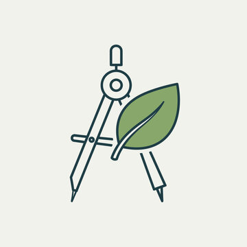 Drawing compass with green leaf.