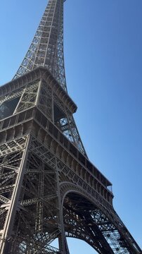 Imposing iron lattice rising amidst infinite blue expanse