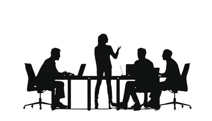 Fototapeta premium Business team collaborates around a long desk to discuss important company strategies and new projects.