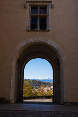 Fototapeta premium View of the still snow-capped Pyrenees in spring from the gateway of the Château de Pau overlooking the Boulevard des Pyrénées