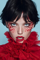 Fototapeta premium Captivating Red Frills: A Bold Fashion Portrait
