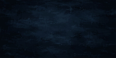 Fototapeta premium Dark navy grunge textured background with abstract distressed paint, rough brush strokes and scratched vintage wall pattern, deep blue gradient backdrop with aged worn surface style.