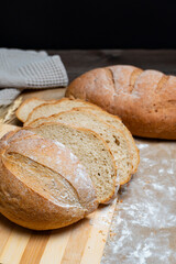 Fototapeta premium Sliced Rustic Bread with Wheat