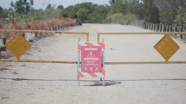 A sign warning of the dangers of the air quality in the Tijuana River Valley in San Diego, California, due to cross-boundary pollution